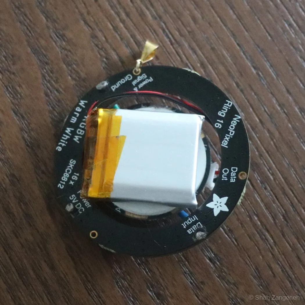 Back of the pendant — LiPo battery mounted behind the ring